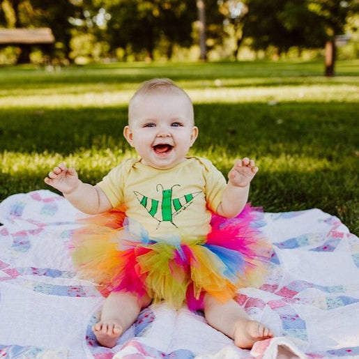 Baby Nola models Tashiba Johnson's butterfly onesie   photo by Riley Curry Photography
